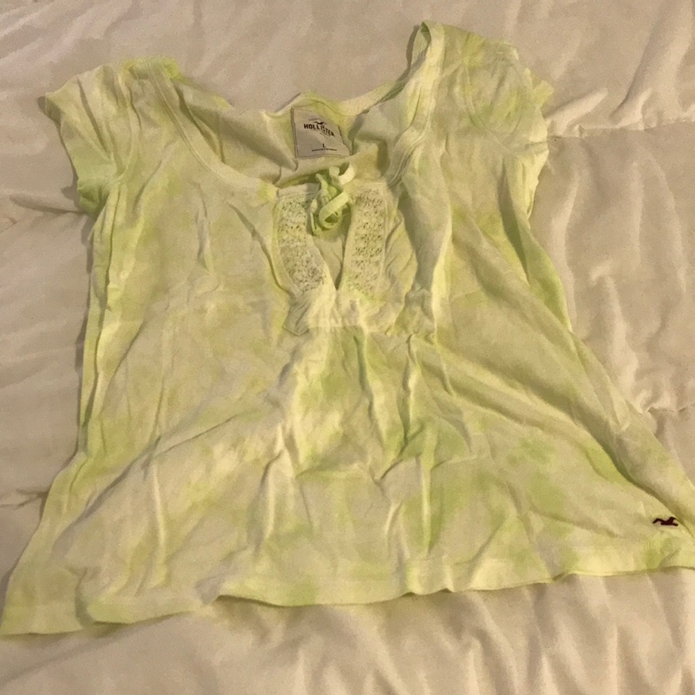 Light green shirt.